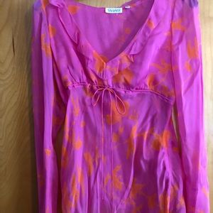 Silk flowy top with side zipper. Long sleeves